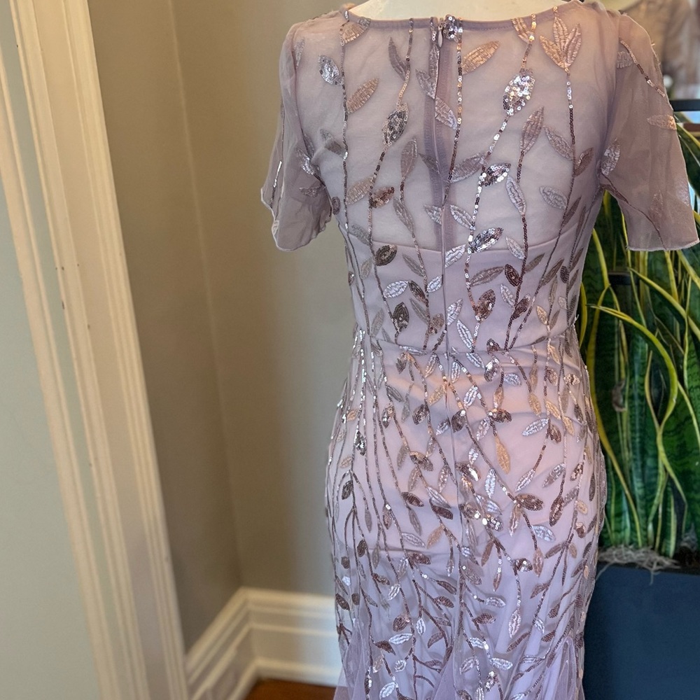 Mauve/lavender Sequin Tull dress. Only worn once. I am 5’7” and wore 2” heels.